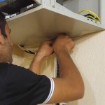 Paulo Henrique fazendo ajustes nos cabos