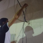 Aluno Orlem fazendo os ajustes nos cabeamentos da secretaria